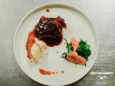 Beef cheek, horseradish mashed potatoes and sautéed agretti